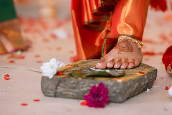 Traditional silver payal anklet on bride's foot